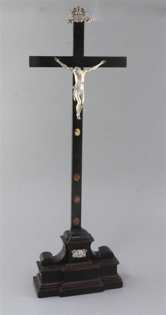 A late 19th century Italian white metal, silvered bronze and ebonised crucifix, 24in.